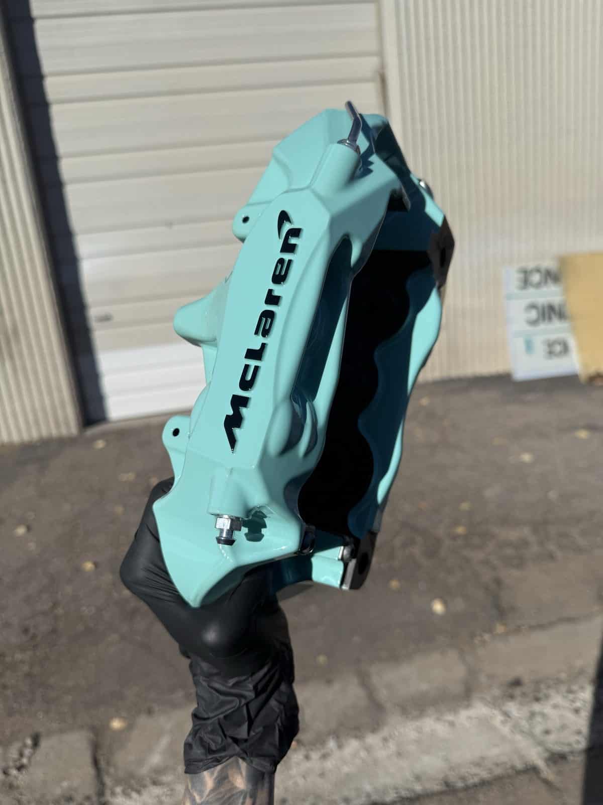 McLaren teal brake caliper powder coating Denver