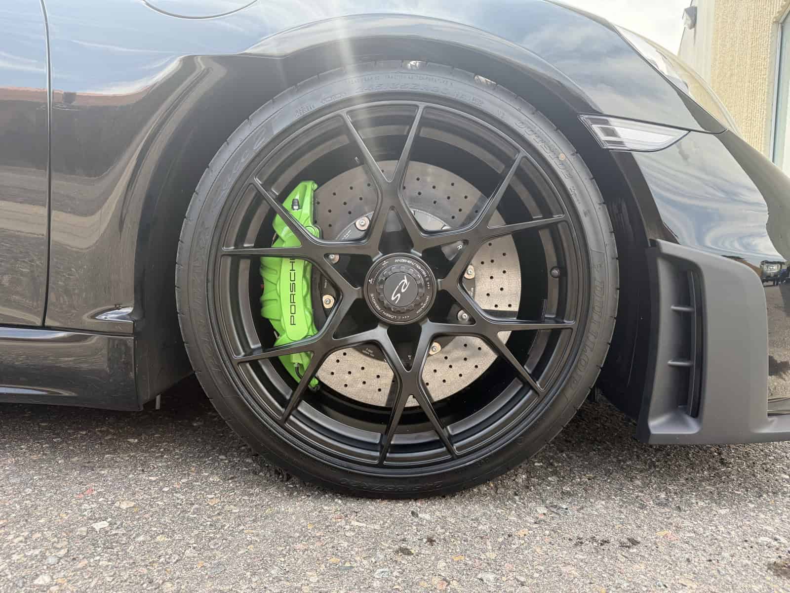 Porsche green powder coated caliper close-up Denver