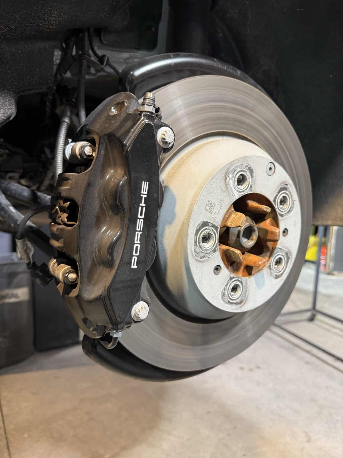 Porsche caliper before powder coating rear view