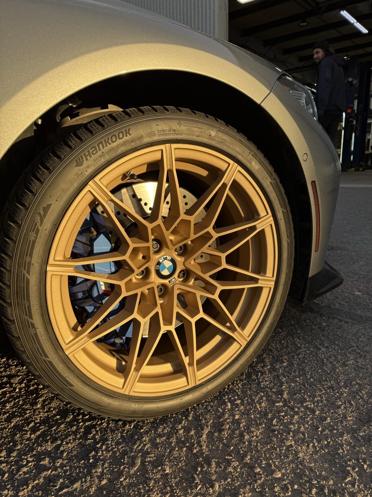 BMW M3 gold wheels rear angle