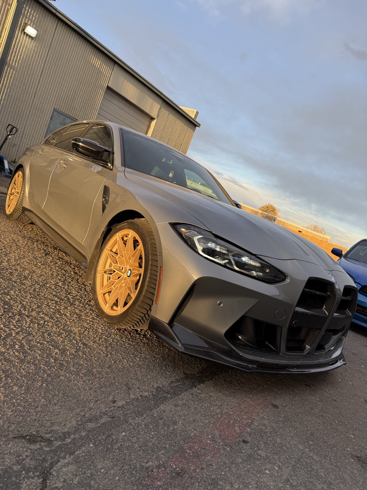 BMW M3 gold wheels side view