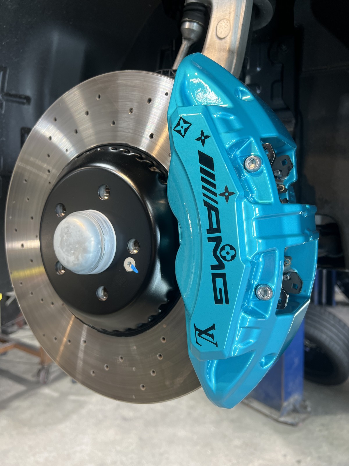 AMG teal caliper with custom LV decal Denver