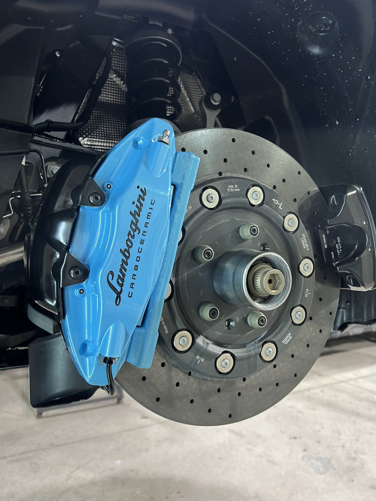 Lamborghini Carboceramic blue caliper rear angle Denver