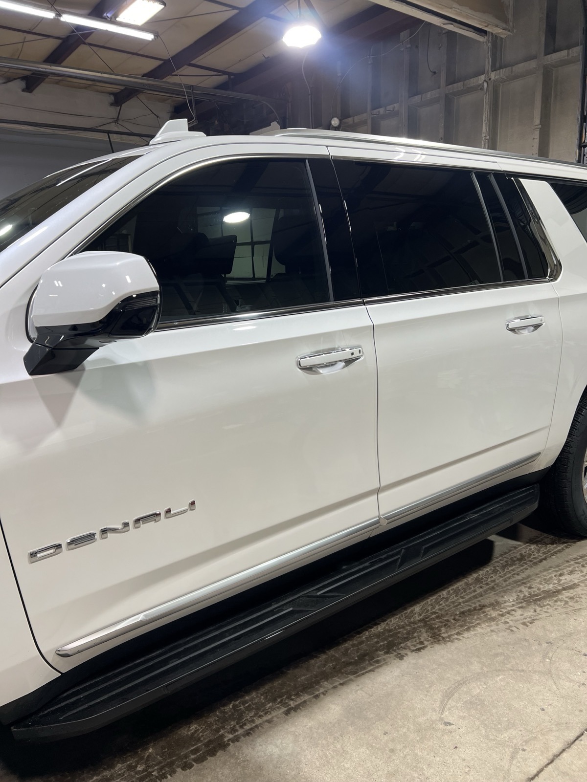 BEFORE: White Yukon Denali chrome side profile Denver