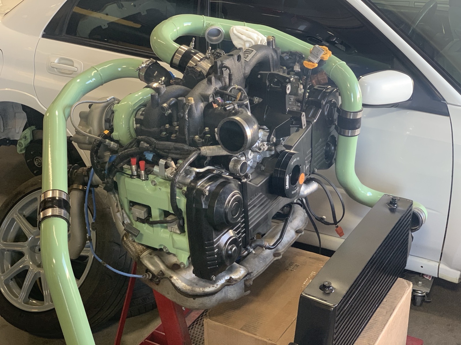 Mint green engine on stand powder coated Denver Colorado