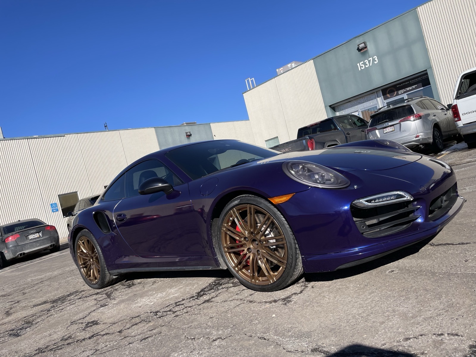 Purple Porsche 911 with gold powder coated wheels