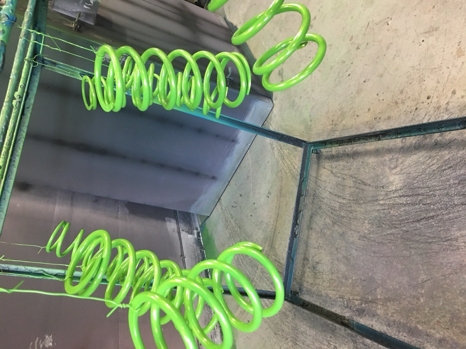 Neon green coil springs powder coated Denver