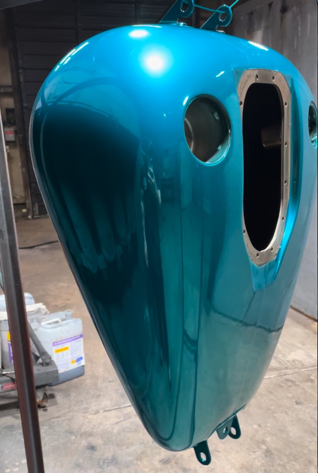 Teal powder coated motorcycle gas tank Denver