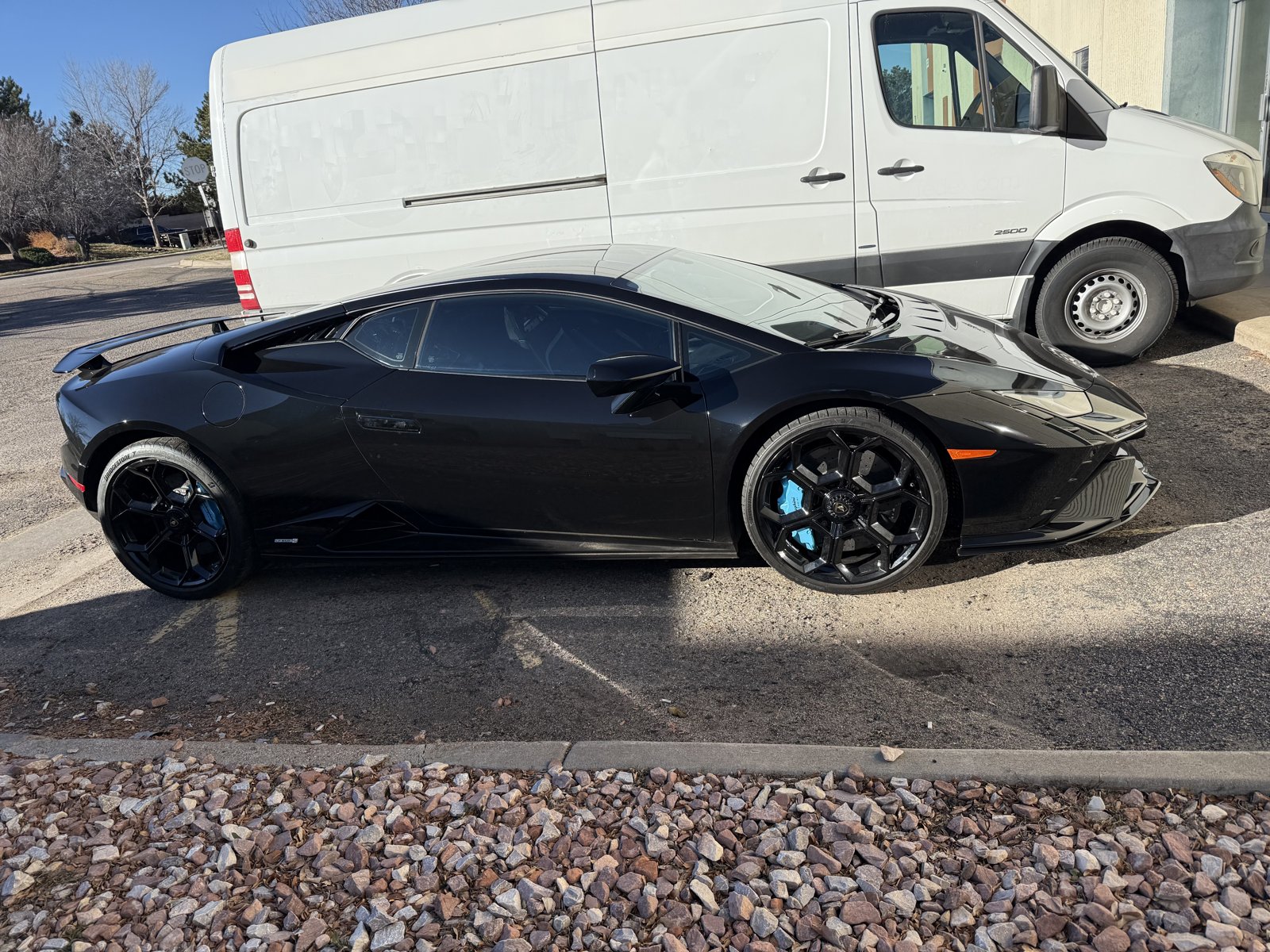 Black Lamborghini Huracan with powder coated wheels
