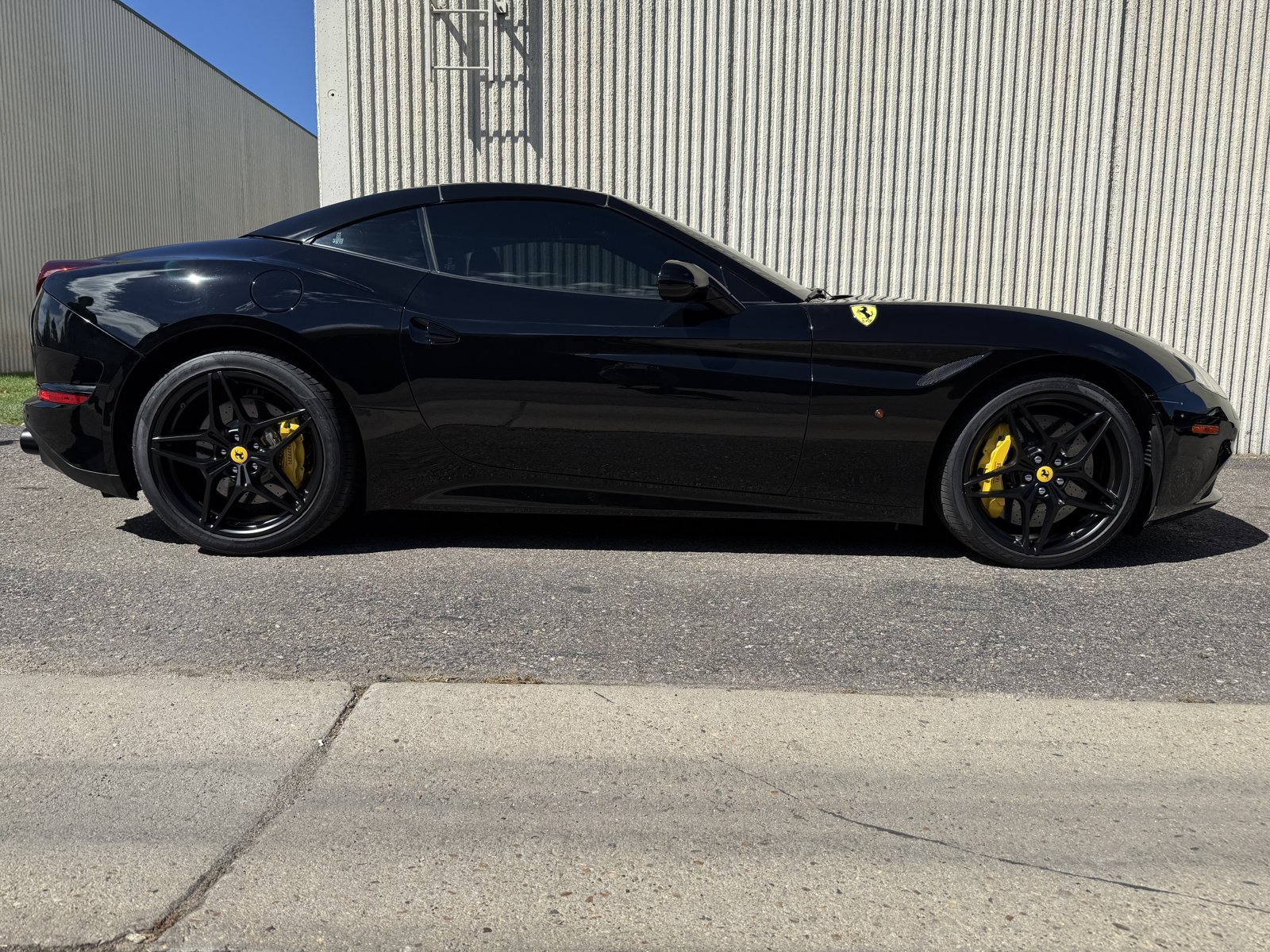 Black Ferrari California with powder coated wheels