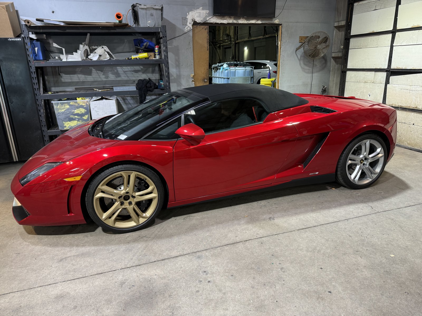Red Lamborghini Gallardo with gold powder coated wheels
