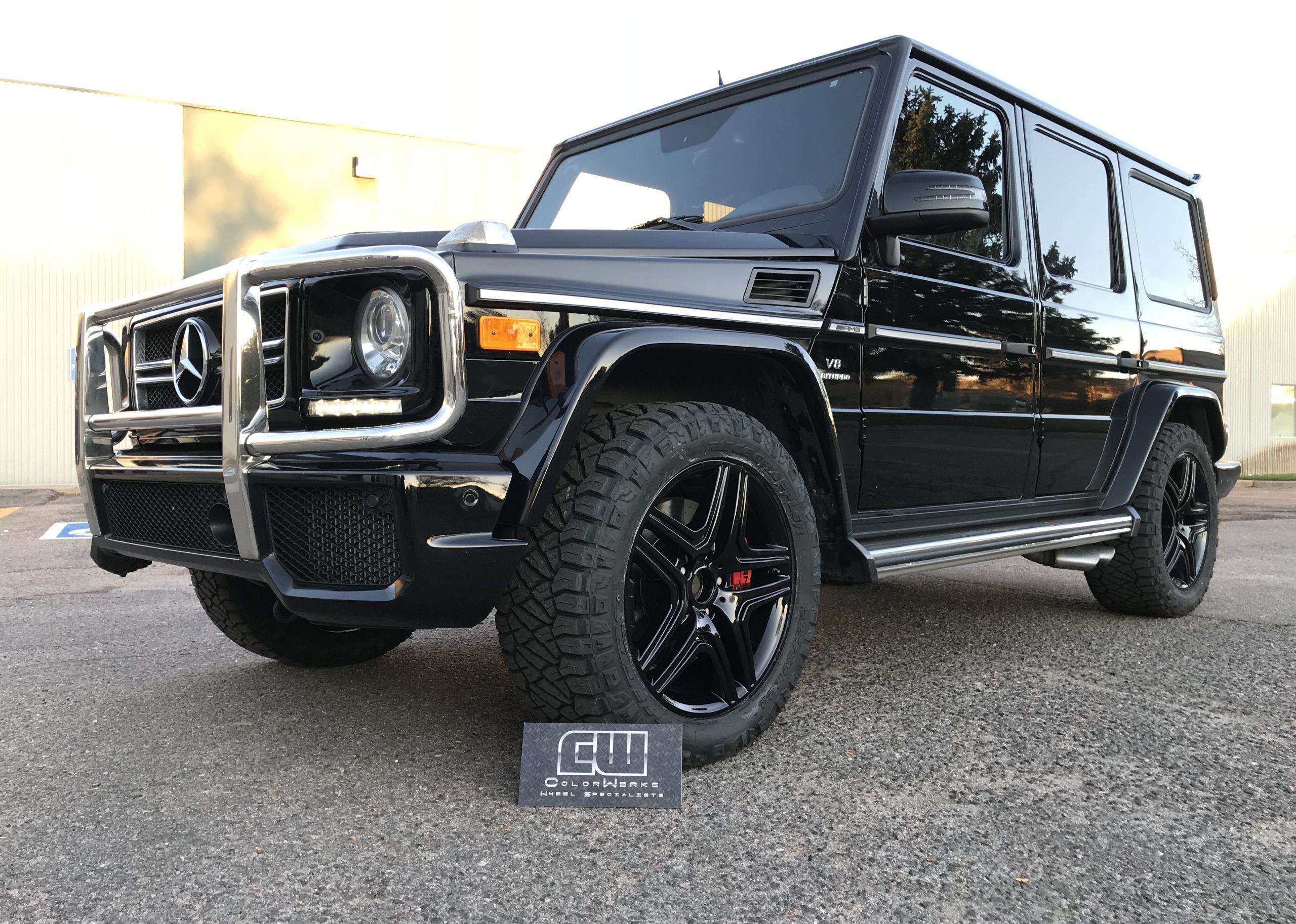 Gloss black G-Wagon wheels powder coated in Denver